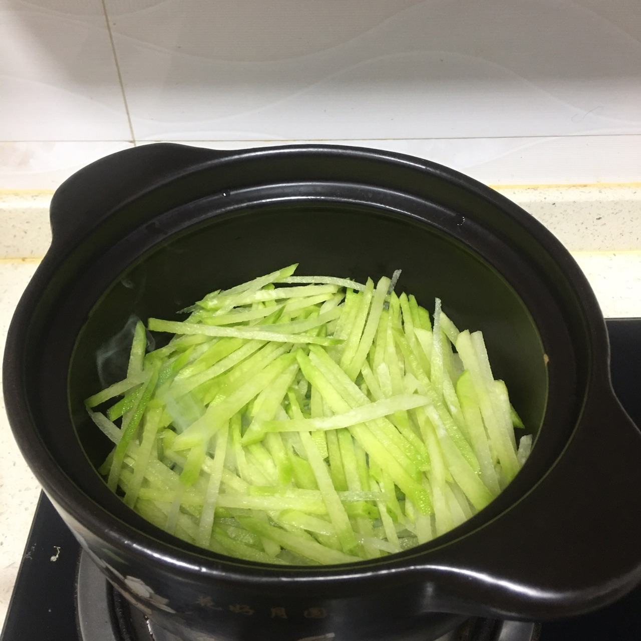 【高汤黄金饺煲】