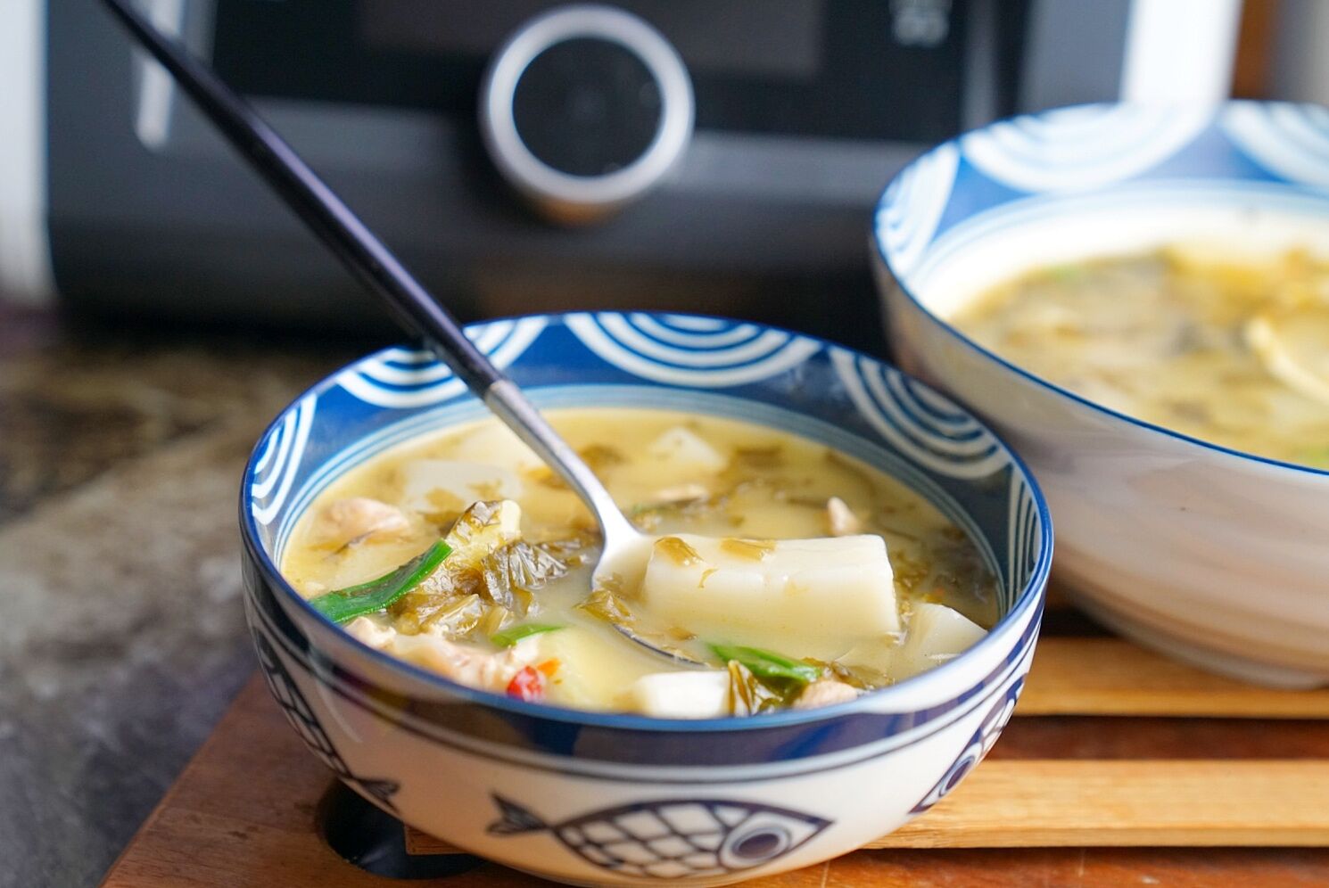 鸡肉丁酸菜汤年糕
