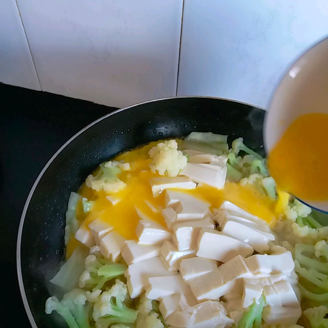煎蛋内酯豆腐有机花