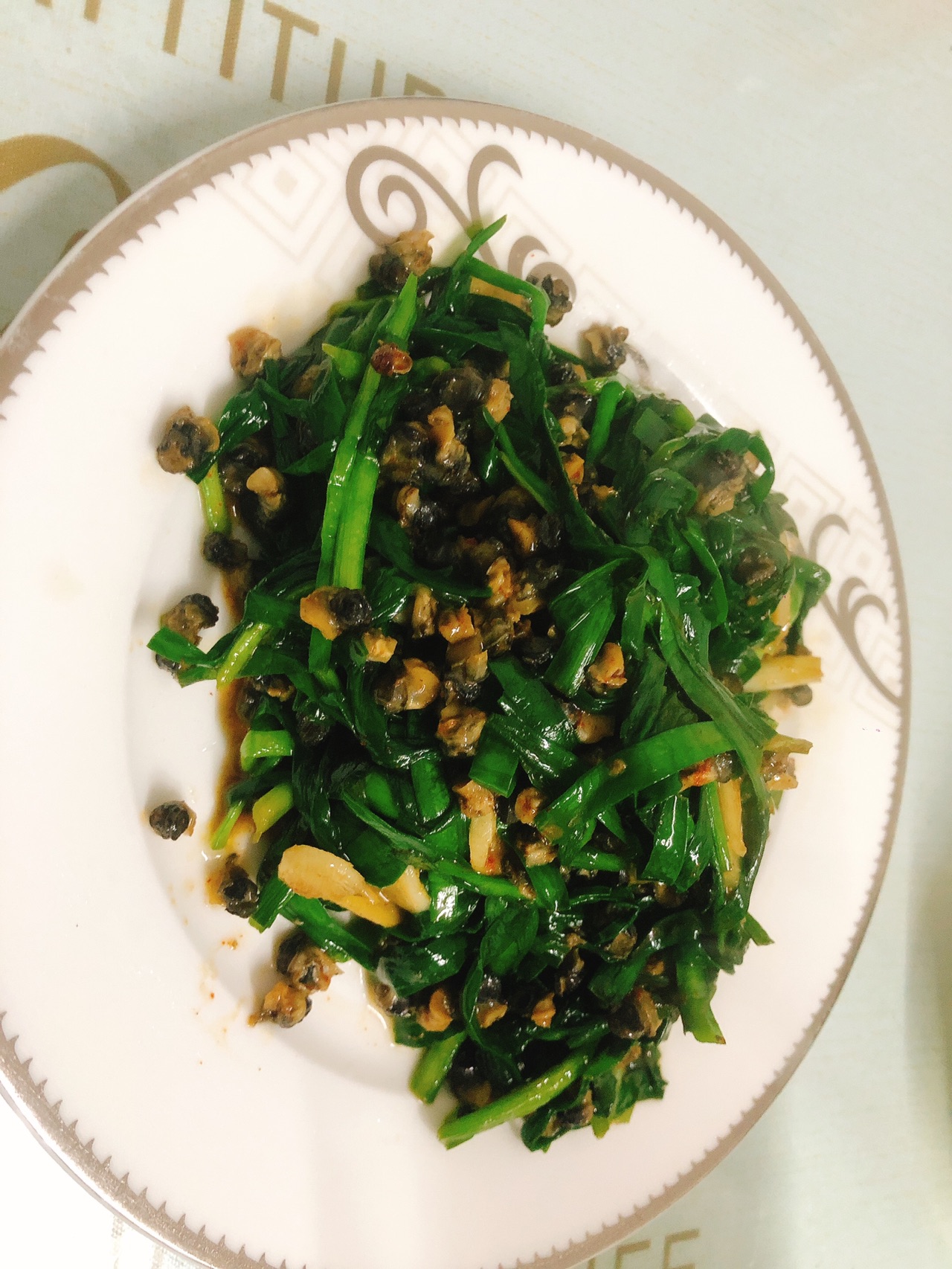 韭菜炒螺丝肉