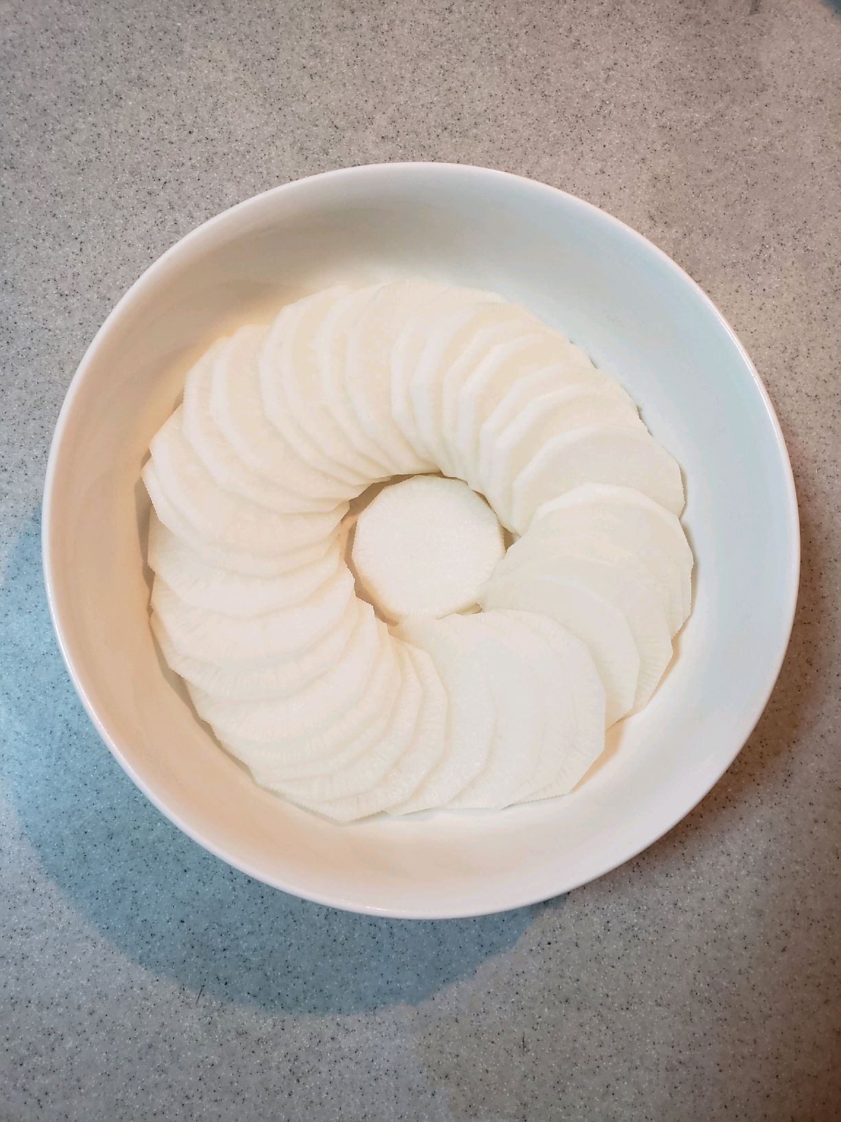 清甜鲜香的寿喜瑶柱蒸萝卜