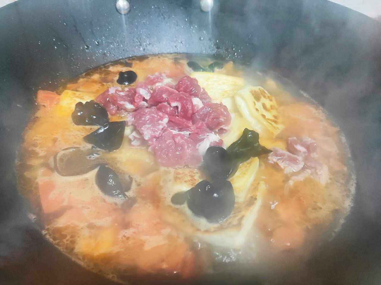 西红柿肉片炖豆腐